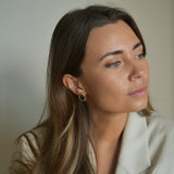 Oval ribbed statement studs - Black